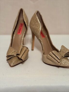 Betsey Johnson Prince d'Orsay evening pumps in gold glitter.